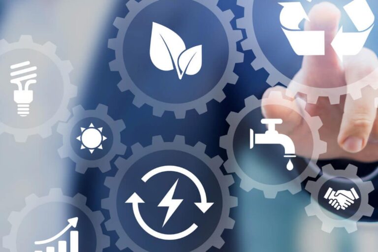 Symbolische Zahnräder für Energieeffizienz und Nachhaltigkeit, repräsentieren die Beratungsphilosophie von PB-TGA GmbH