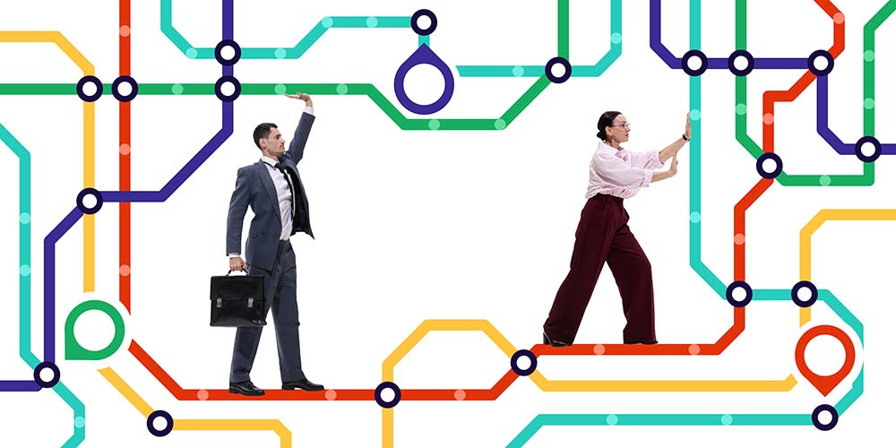 Konzeptionelle Darstellung der perfekten Verkehrsanbindung: Mitarbeiter von PB TGA navigieren mühelos auf einem bunten Liniennetz, das für eine gute Infrastruktur und Erreichbarkeit der Standorte steht